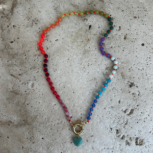 Rainbow necklace with neon orange thread