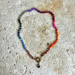 Rainbow necklace with orange thread