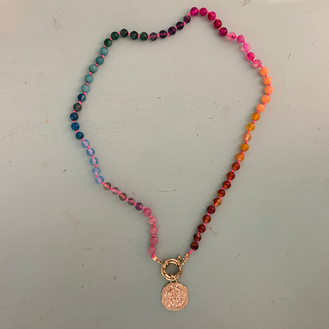 Rainbow necklace with neon pink thread